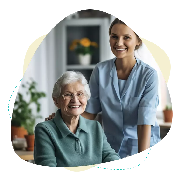 pflege-kosten-pflegehilfszentrale Eine freundliche Pflegekraft mit einer zu pflegenden älteren Dame